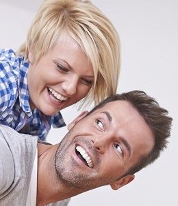 Smiling Couple with Healthy Teeth