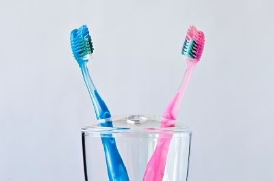 tooth brushing helps prevents gum disease