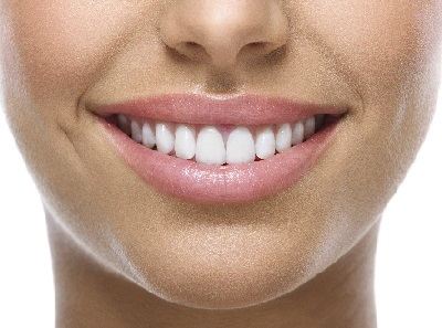 woman's smile sensitive teeth